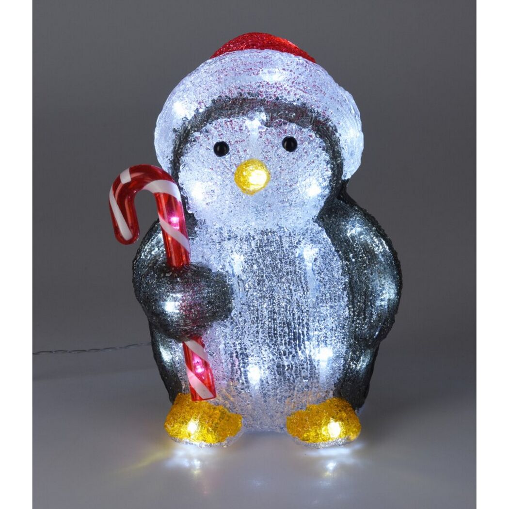Vier weihnachtliche Tierfiguren mit Zuckerstangen