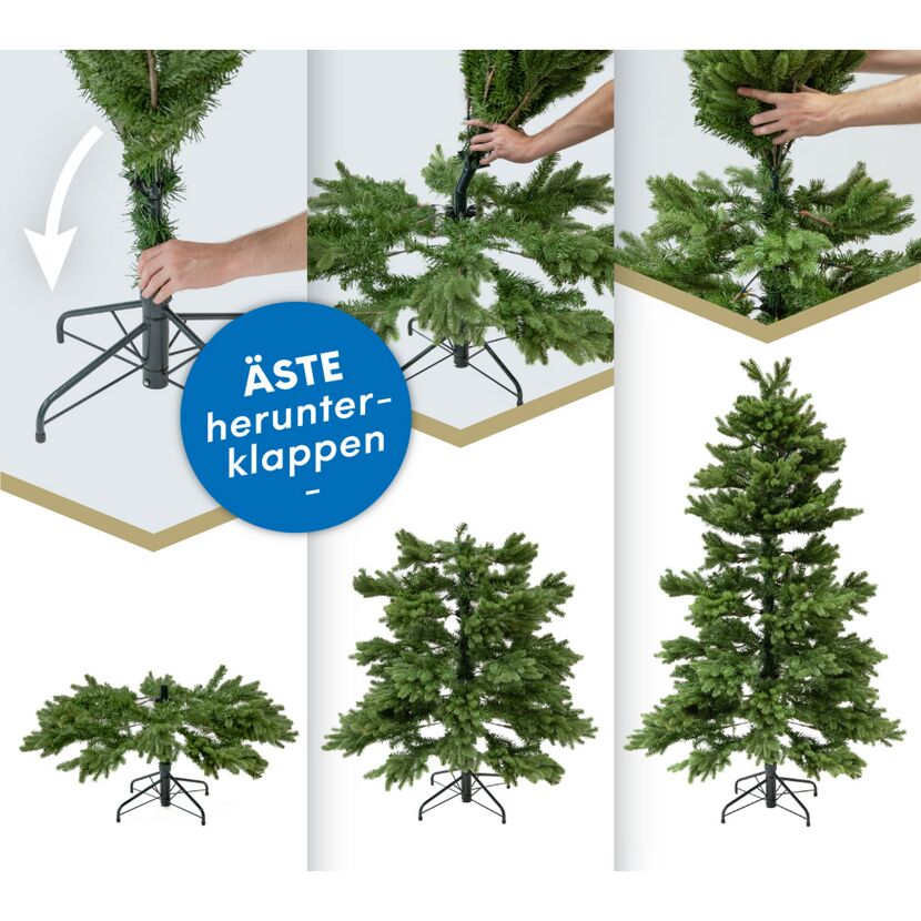 Person beim Aufbau eines künstlichen Weihnachtsbaumes