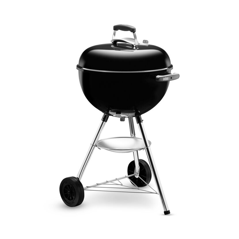 Schwarzer Weber Holzkohlegrill auf drei Beinen