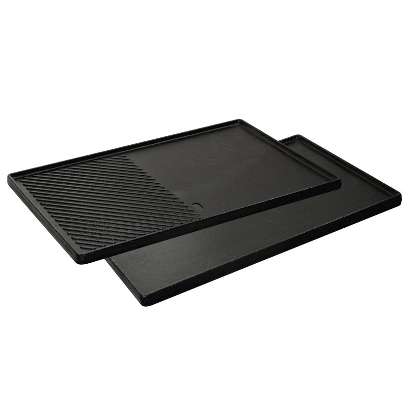 Zwei schwarze gusseiserne Wendeplatten