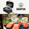 Lachs und grüne Bohnen werden auf einem Lumin Compact Grill gedämpft.