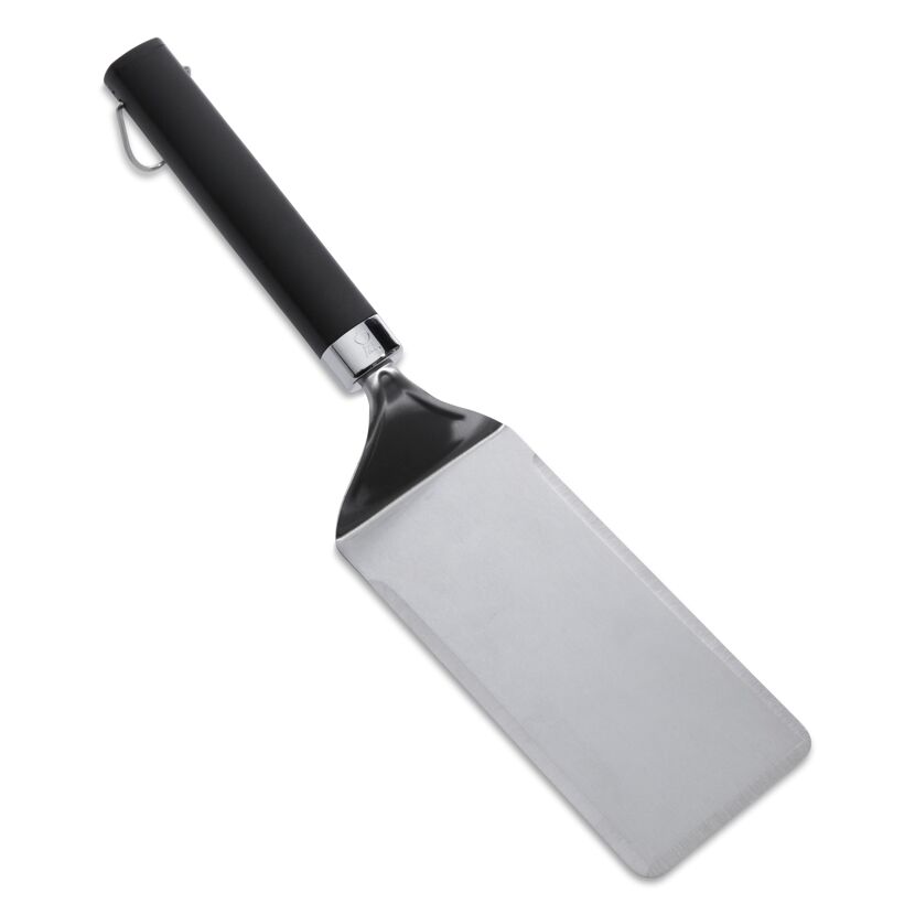 Grillwender mit schwarzem Griff und silberner Fläche