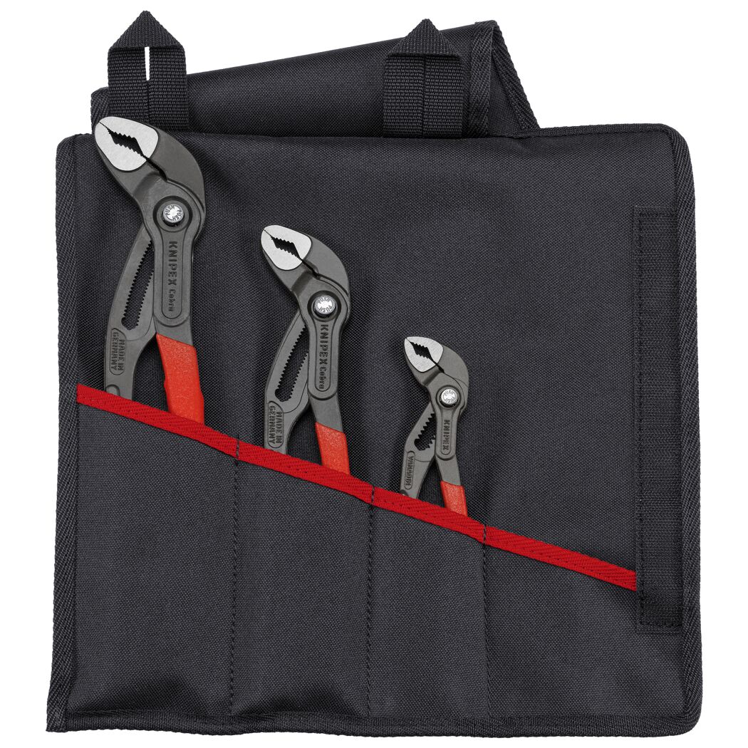 Drei Zangen in einer schwarzen Tasche.
