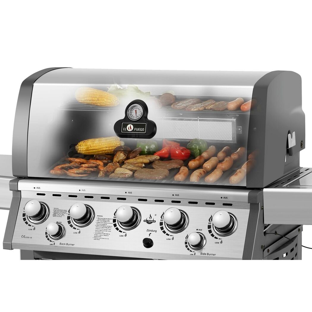 Gasgrill mit verschiedenen Speisen