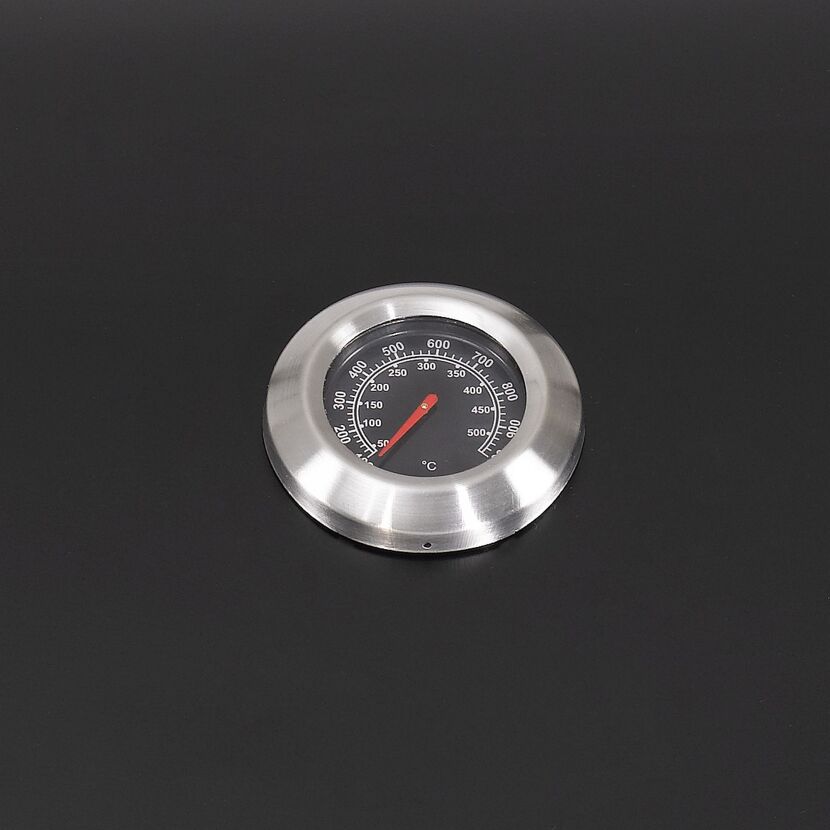 Ein Thermometer eines Gasgrills.