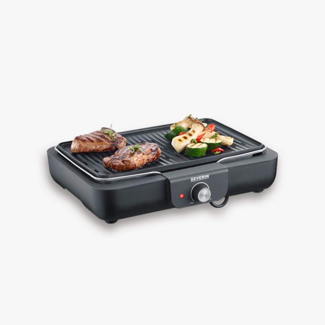 Elektrogrill mit Fleisch und Gemüse