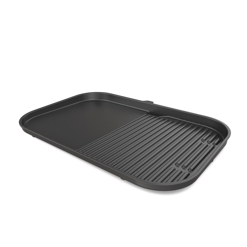 Schwarze Grillplatte mit Fettrinne
