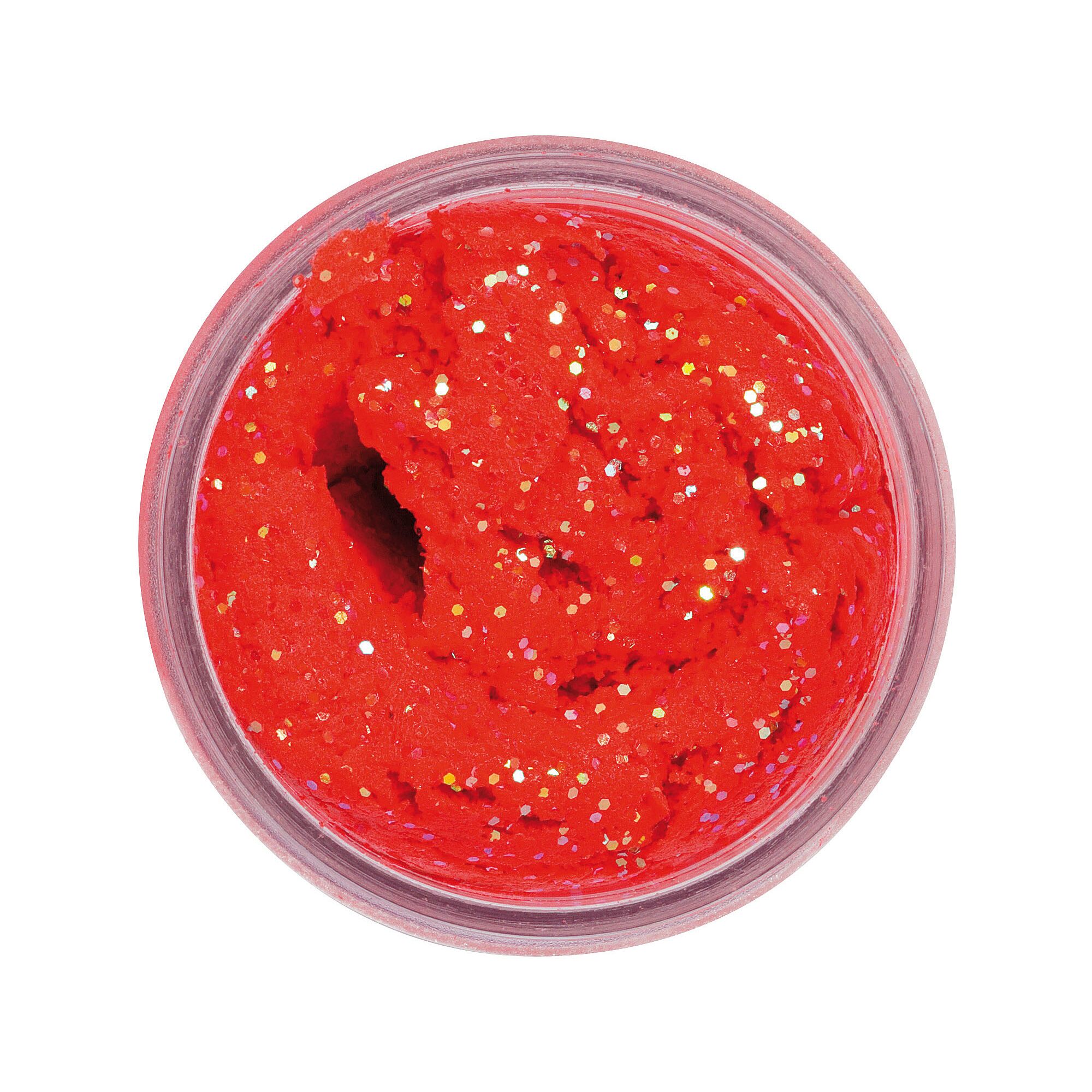 Roter Forellenköder mit Glitzer im Glas.