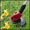 Einhell Akku-Rasentrimmer GE-CT 18 Li Kit beim Trimmen von Gras