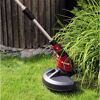 Einhell Elektro-Rasentrimmer GC-ET 450/300 Kit beim Trimmen von Gras