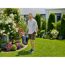 Person hält Mähroboter SILENO minimo im Garten