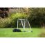 Mähroboter Indego M 700 neben einem Fußballtor im Garten.