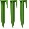Drei grüne Zeltheringe