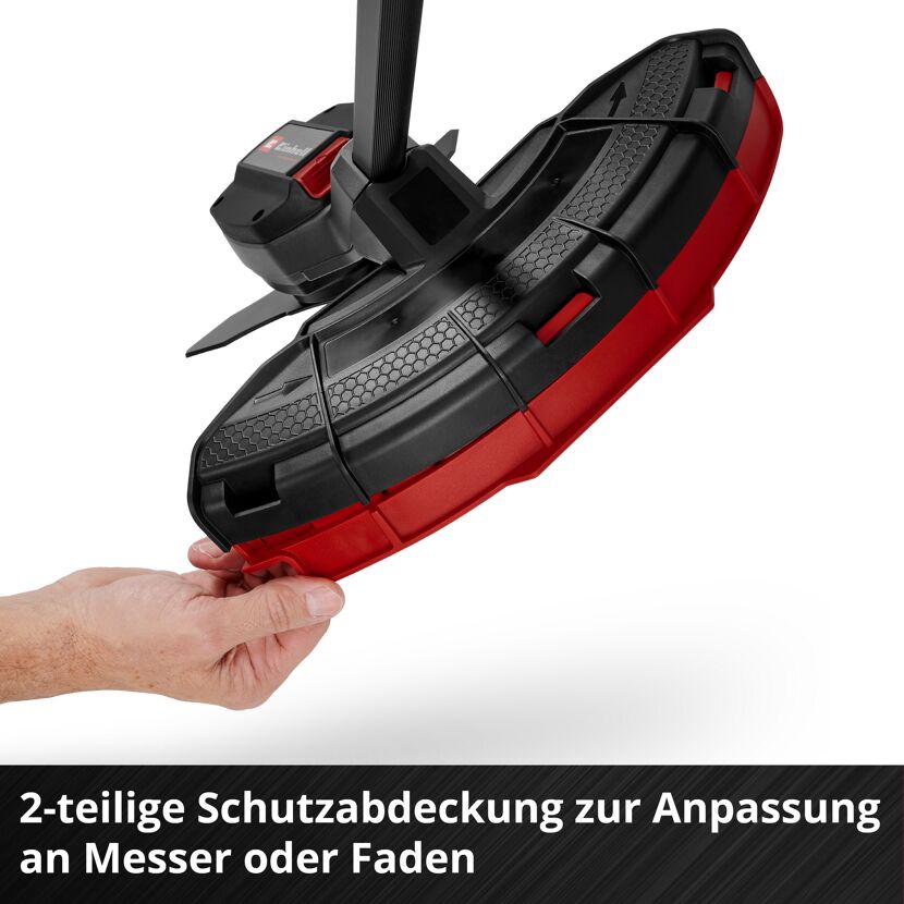 Hand hält Schutzabdeckung für Motorsense