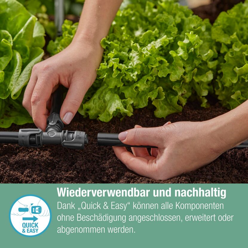 Person verbindet Schlauch mit T-Stück.