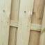 Holzbalken eines Bretterzauns