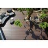 Dielenboden DreamDeck WPC Plati braun mit Gartenmöbeln und Hängematte