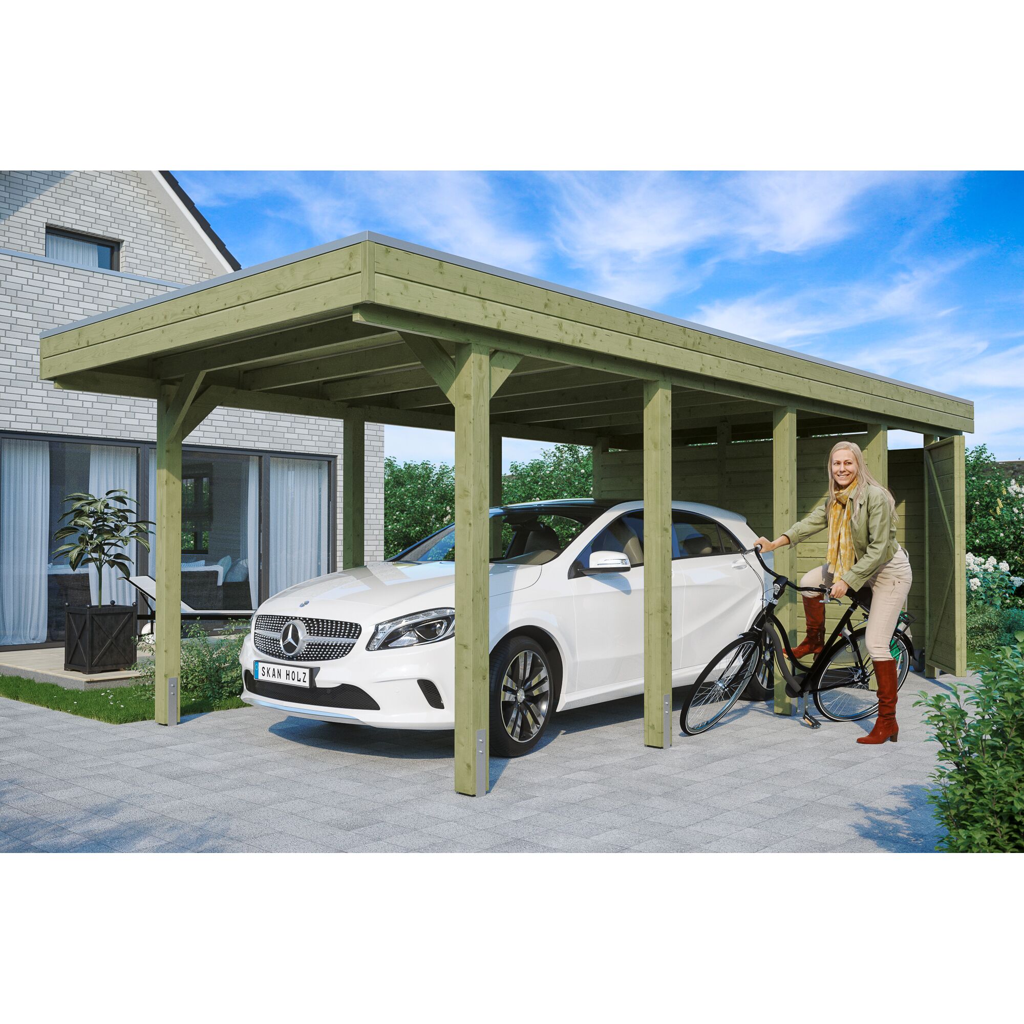 Person schiebt Fahrrad unter grünen Carport neben Auto.