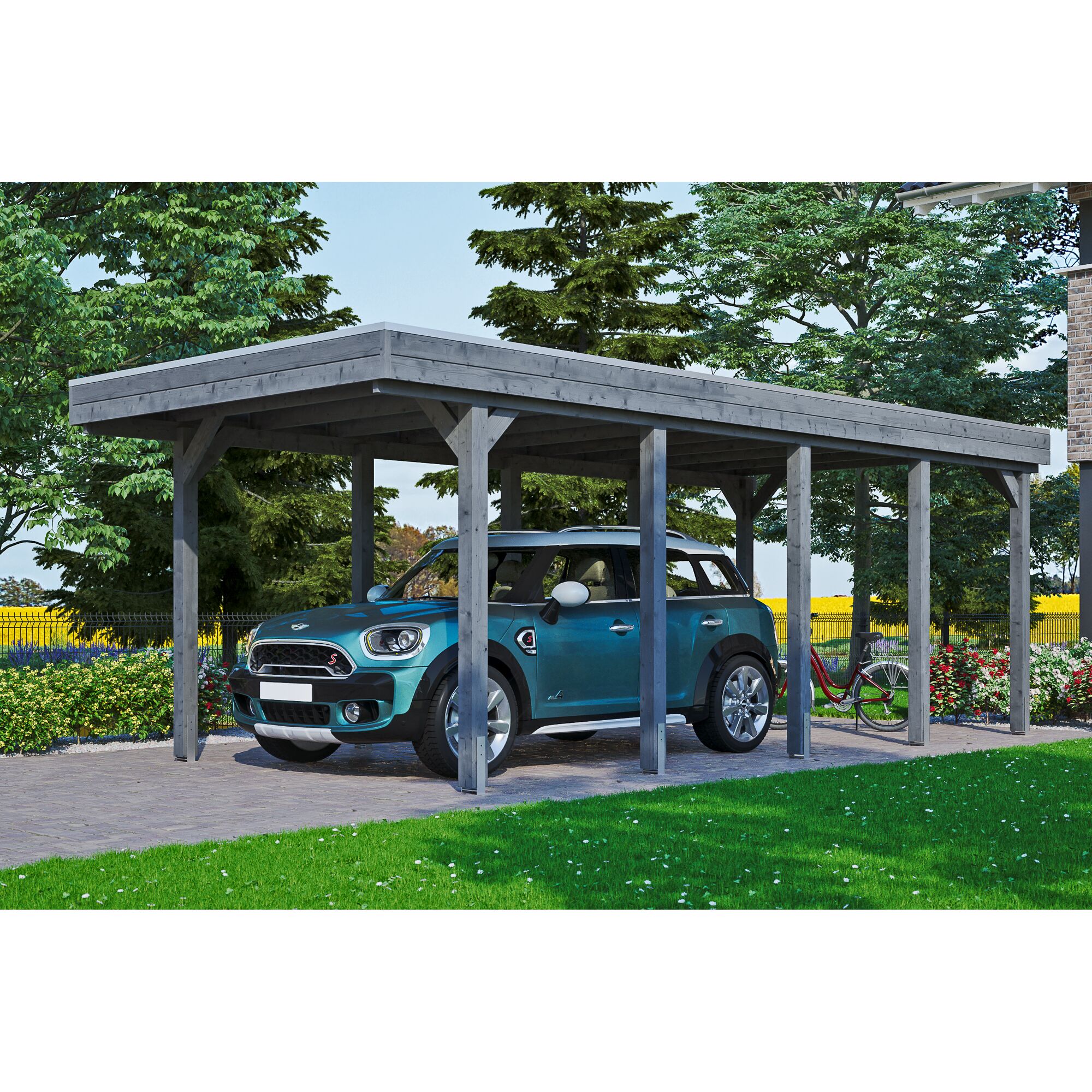 Auto und Fahrrad unter einem grauen Carport