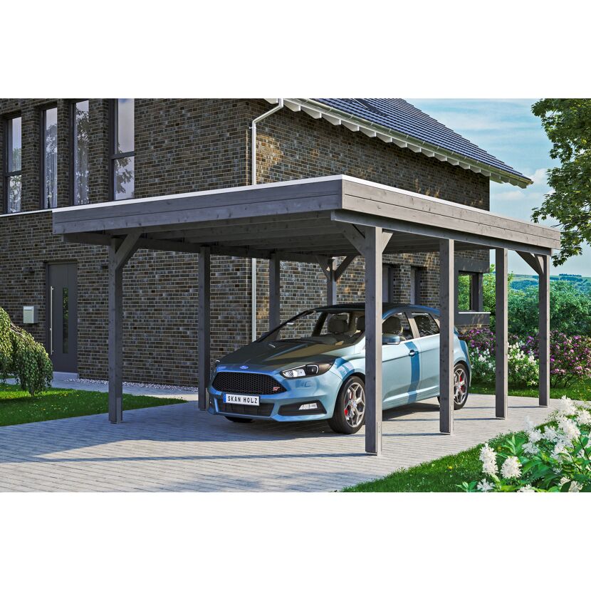 Auto steht unter einem grauen Carport.