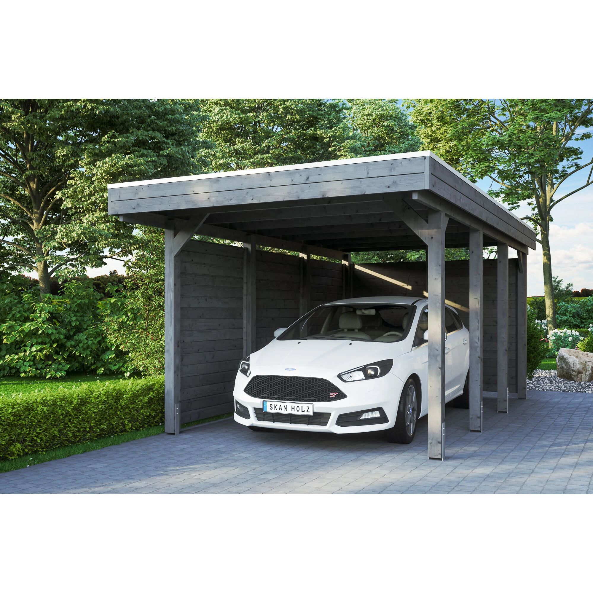 Auto steht unter einem grauen Carport.