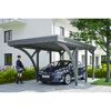 Auto steht unter einem grauen Carport.