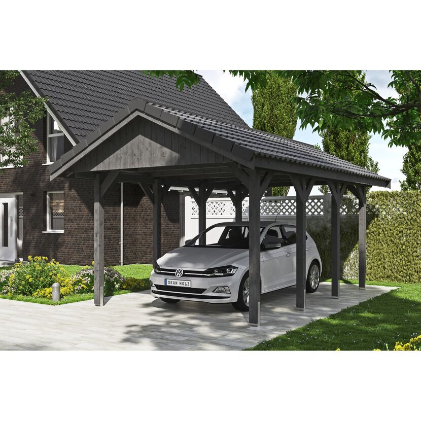 Auto steht unter einem grauen Carport.