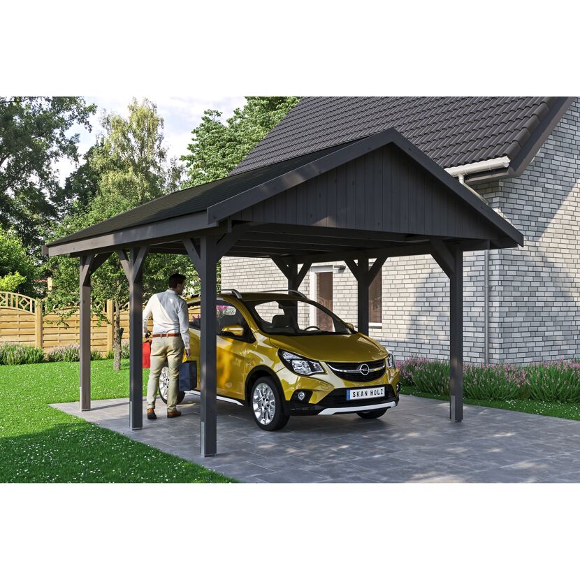 Gelbes Auto unter einem schwarzen Carport.