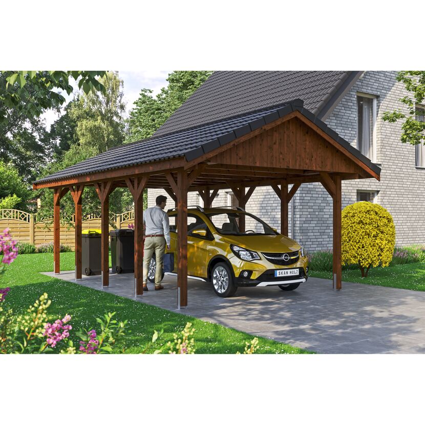 Person parkt gelbes Auto unter einem Carport.