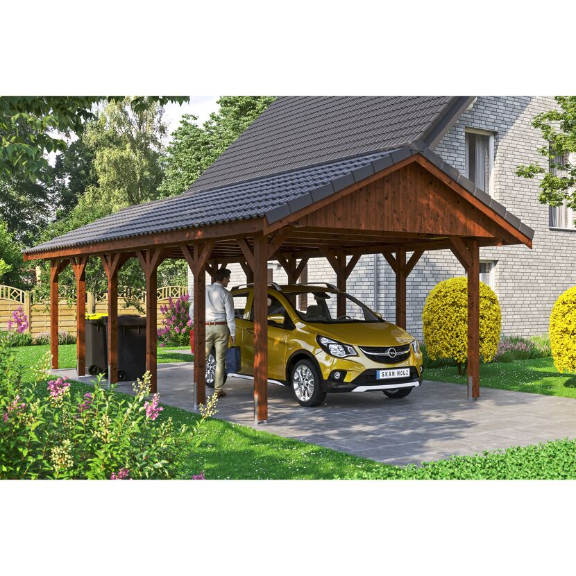 Person parkt gelbes Auto unter Carport