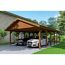 Doppelcarport aus Holz mit zwei Autos und einem Fahrrad