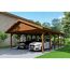 Doppelcarport aus Holz mit zwei Autos und einem Fahrrad