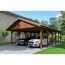 Doppelter Carport aus Holz mit zwei Autos und einem Fahrrad
