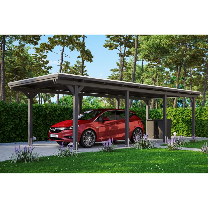 Auto steht unter einem grauen Carport.