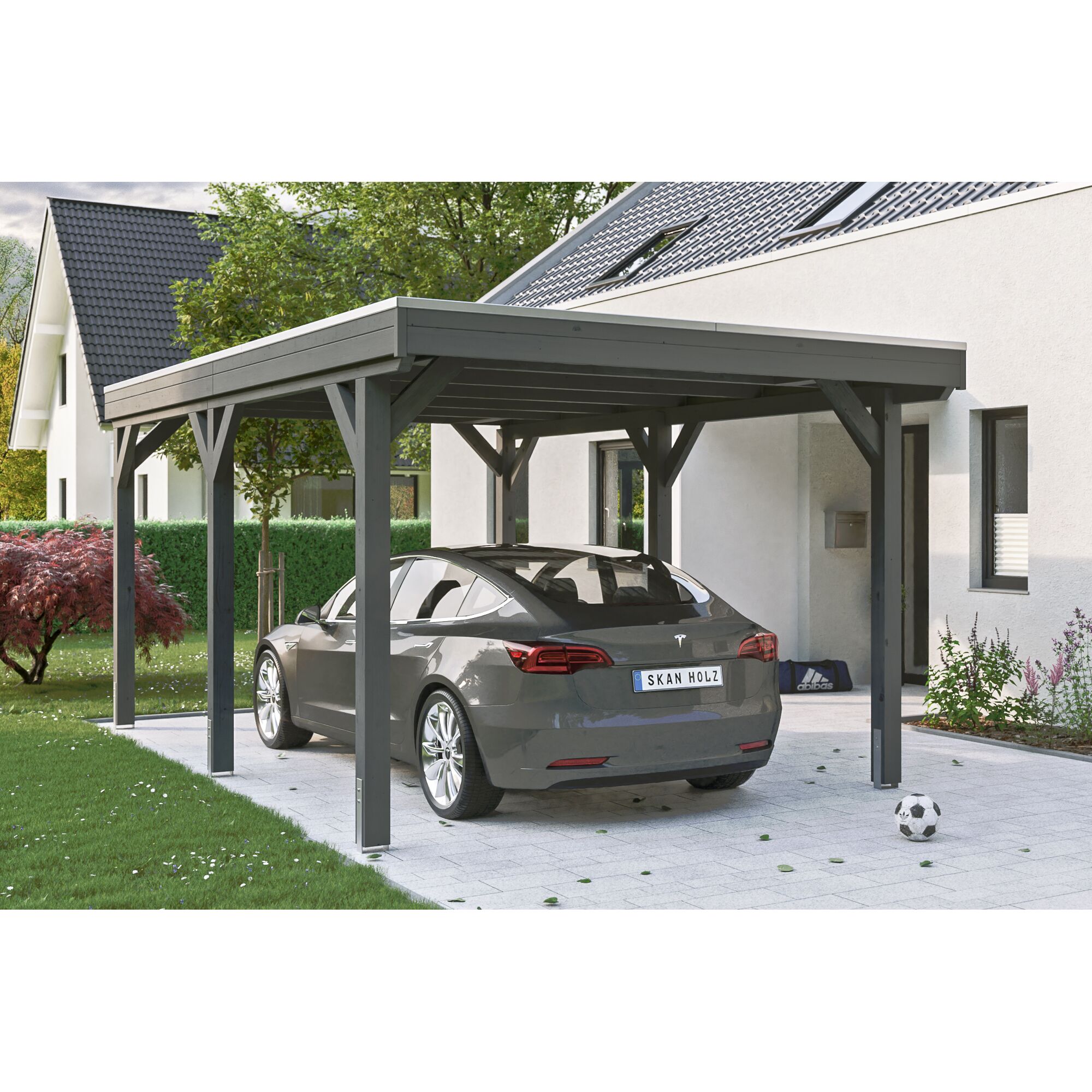 Auto unter einem grauen Carport