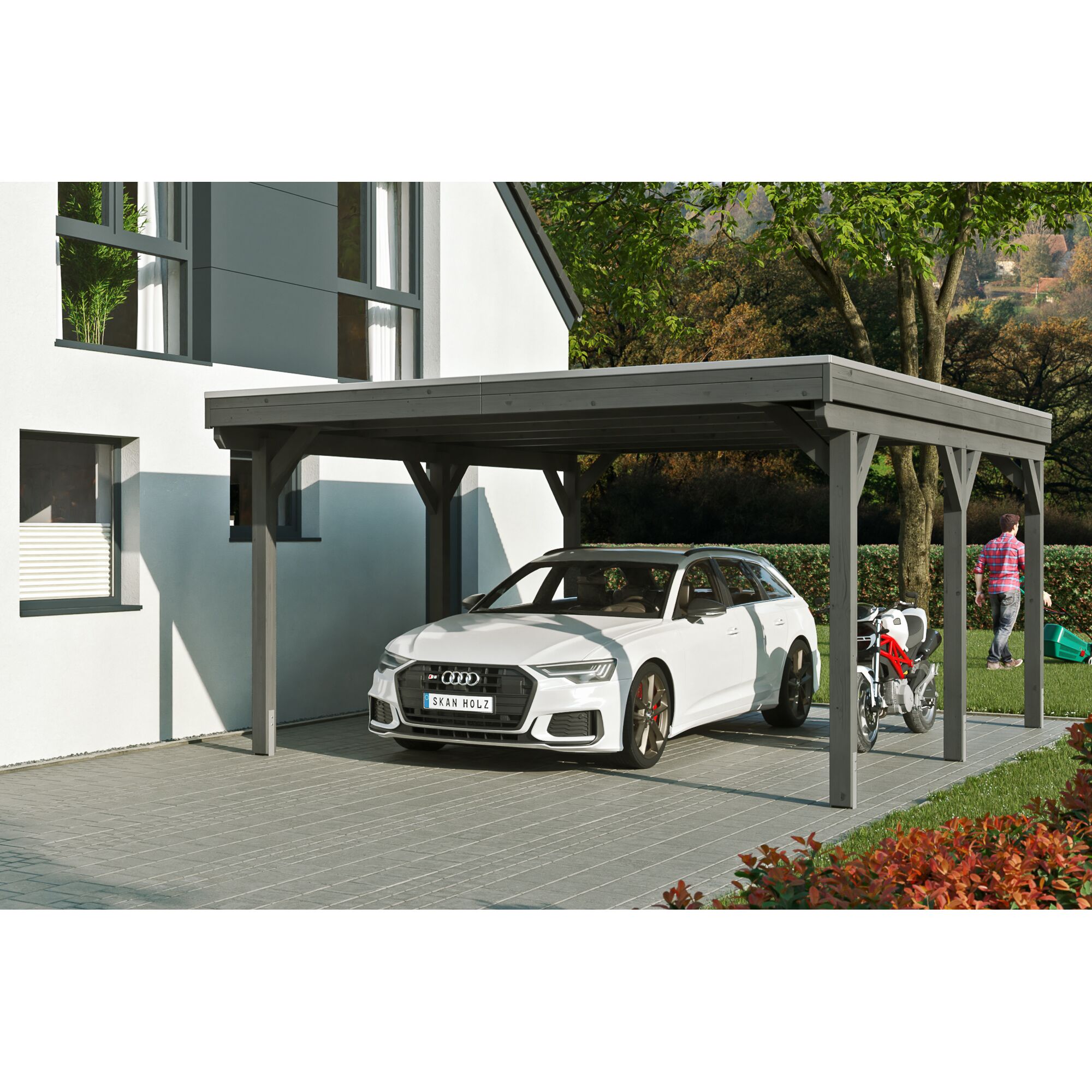 Auto und Motorrad unter einem grauen Carport