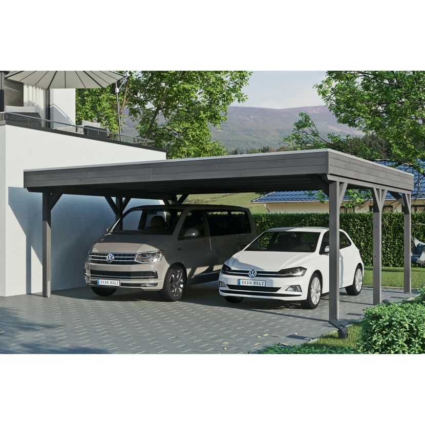 Zwei Autos unter einem grauen Carport.