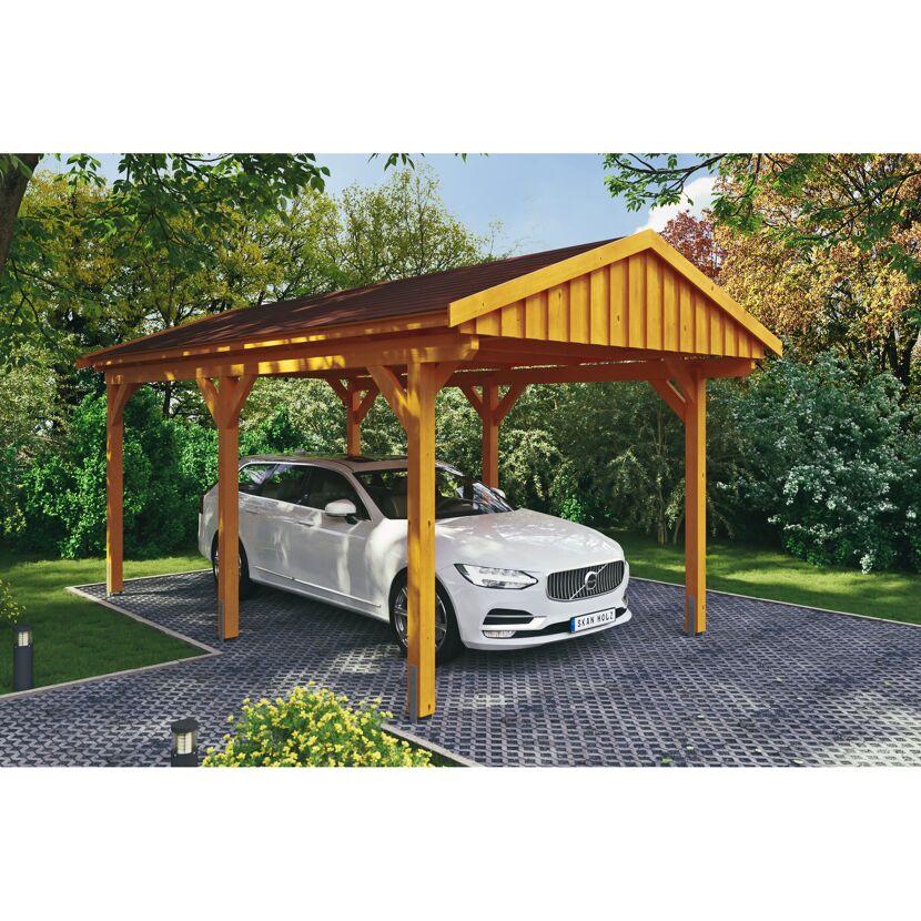 Auto steht unter einem Carport aus Holz.