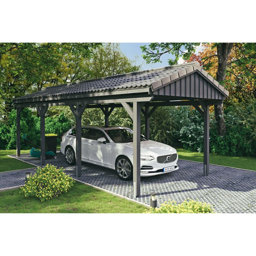 Auto und Rasenmäher unter einem Carport.
