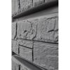 Graue Steinwand des Wandtanks Tower Stone