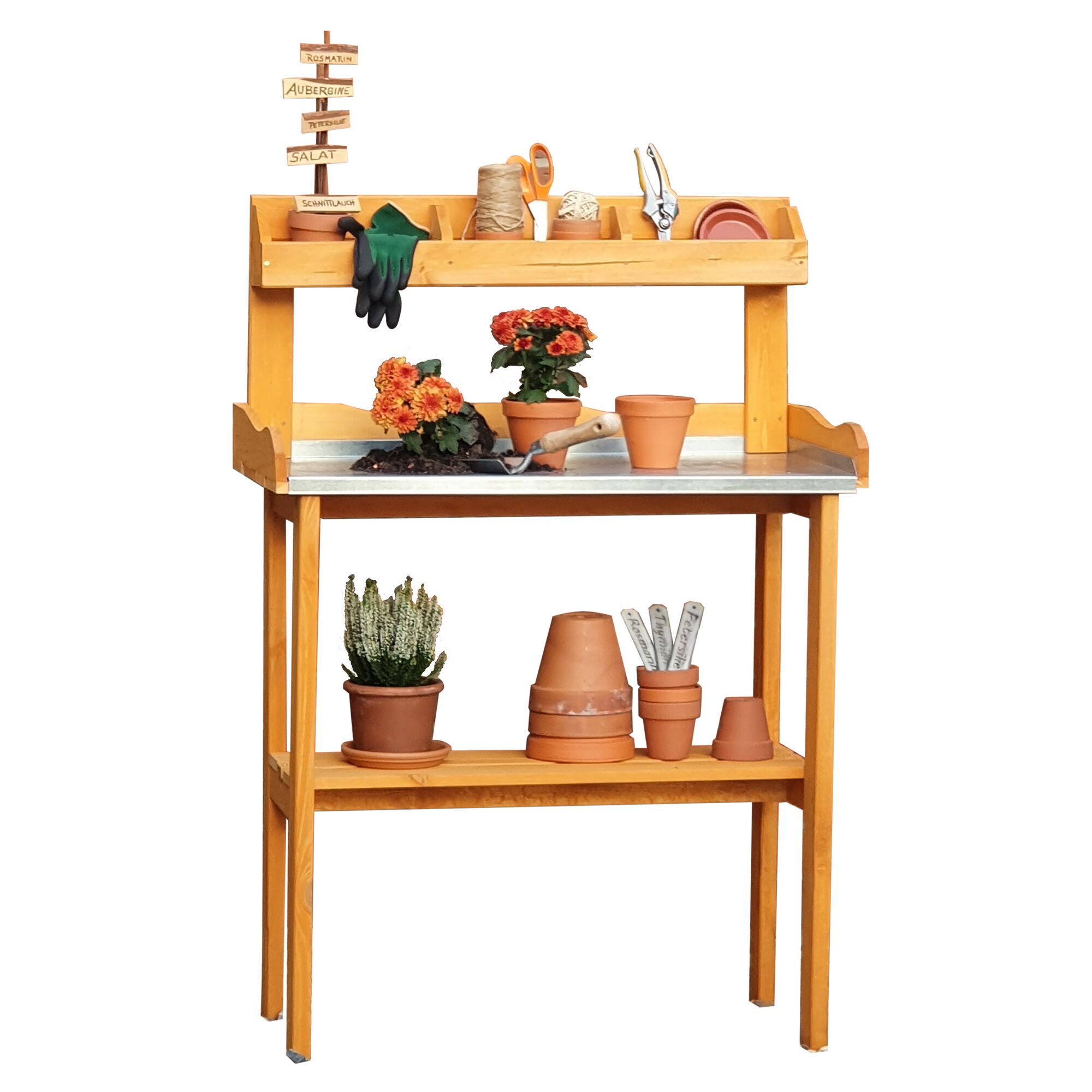 Holztisch mit Gartengeräten und Blumentöpfen