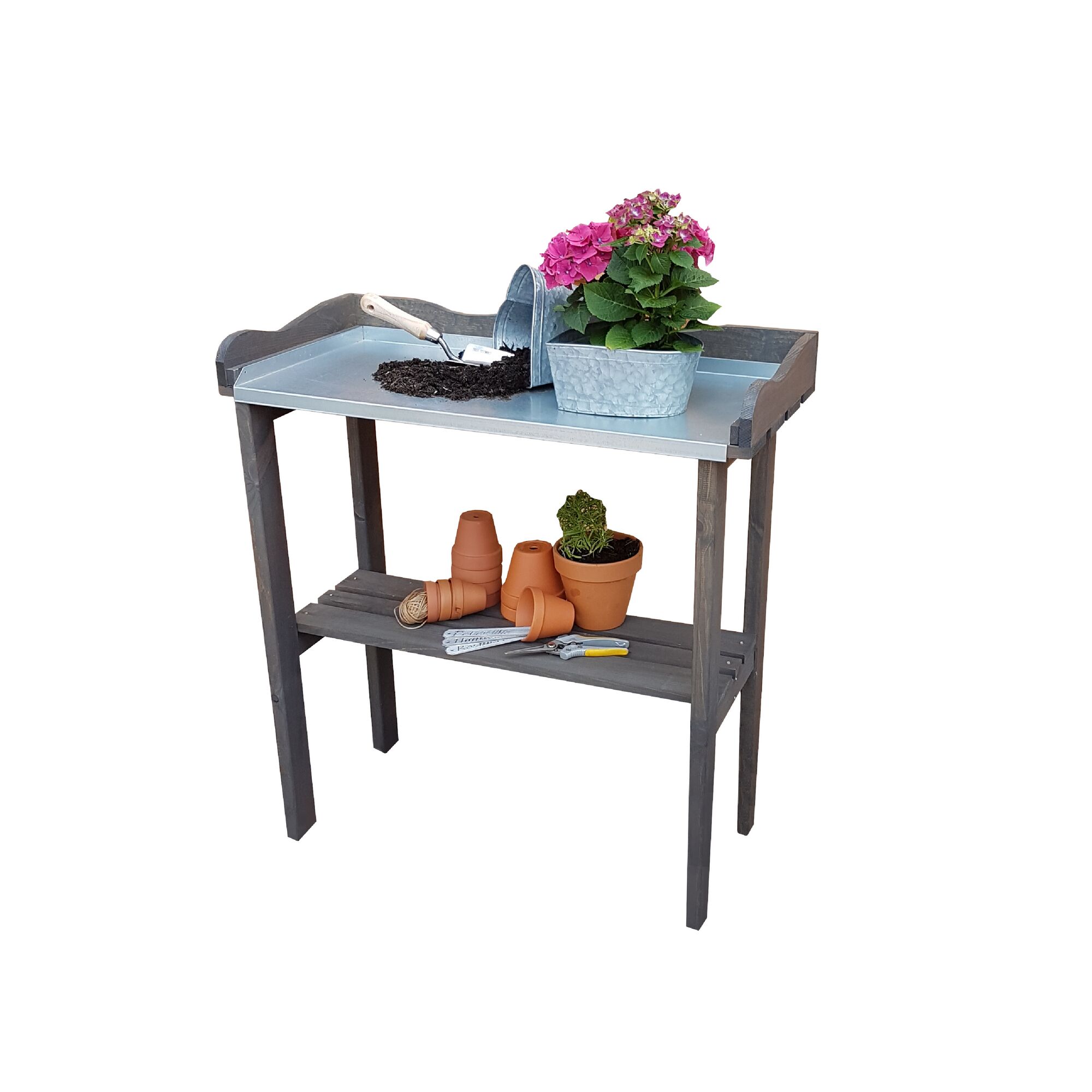 Pflanztisch mit Gartengeräten und Töpfen