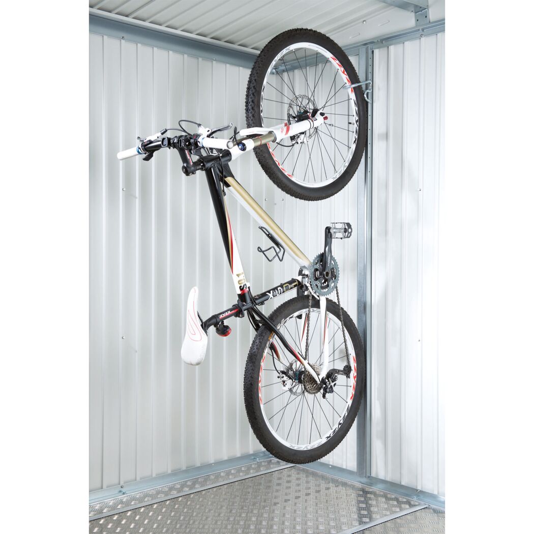 Fahrrad hängt an Fahrradhalter BikeMax an der Wand.