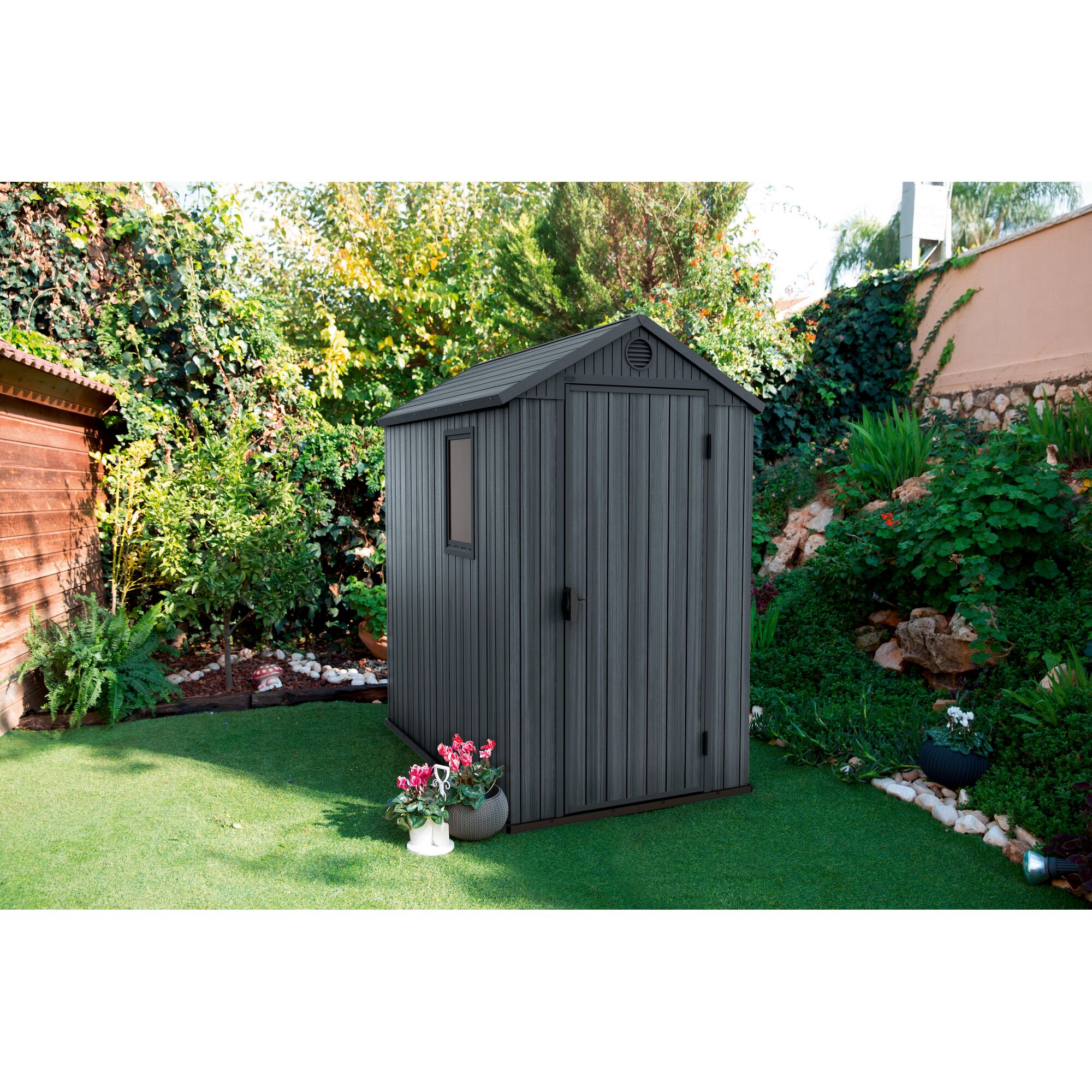 Anthrazitfarbenes Gerätehaus Darwin im Garten
