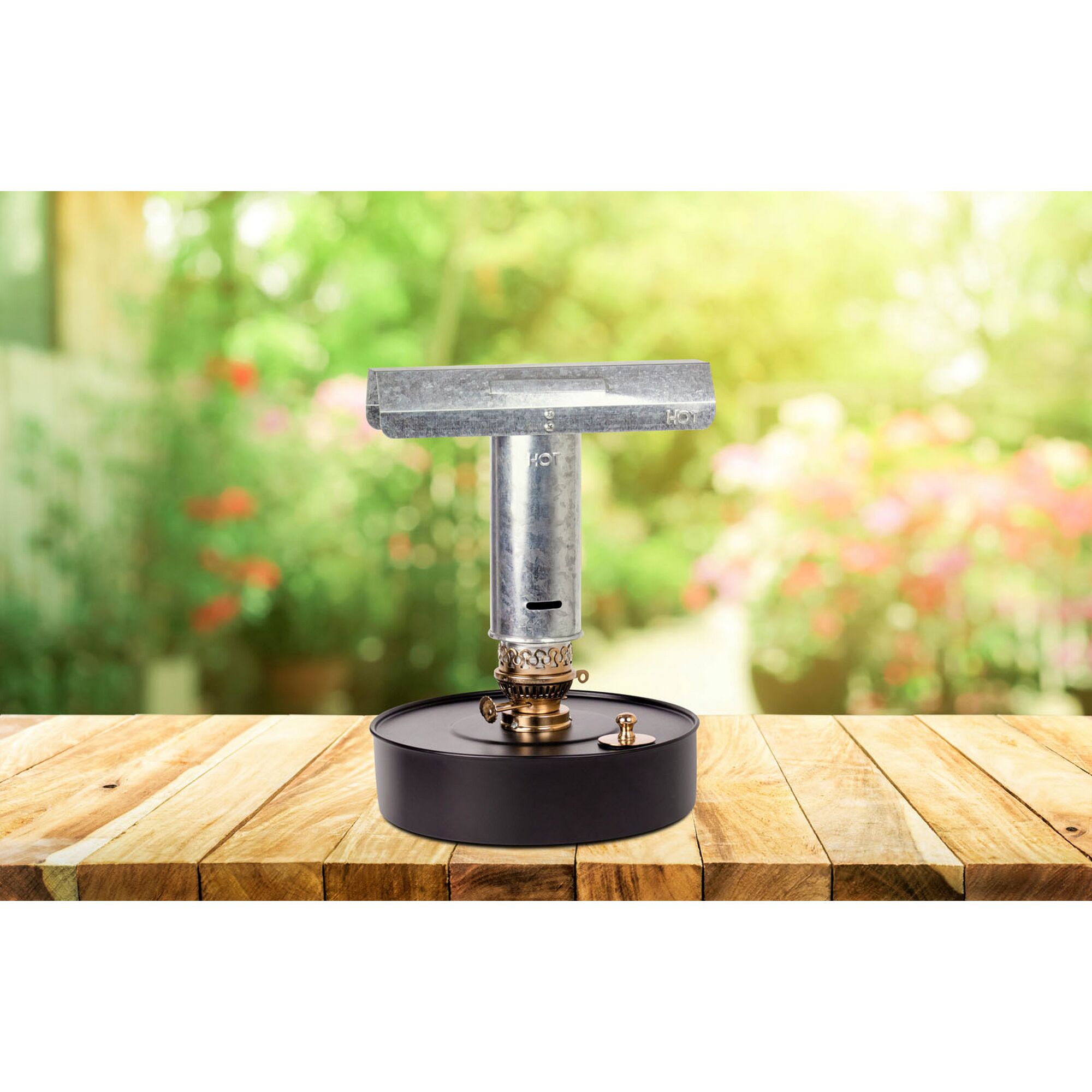 Paraffinheizung VIT Fire auf Holztisch