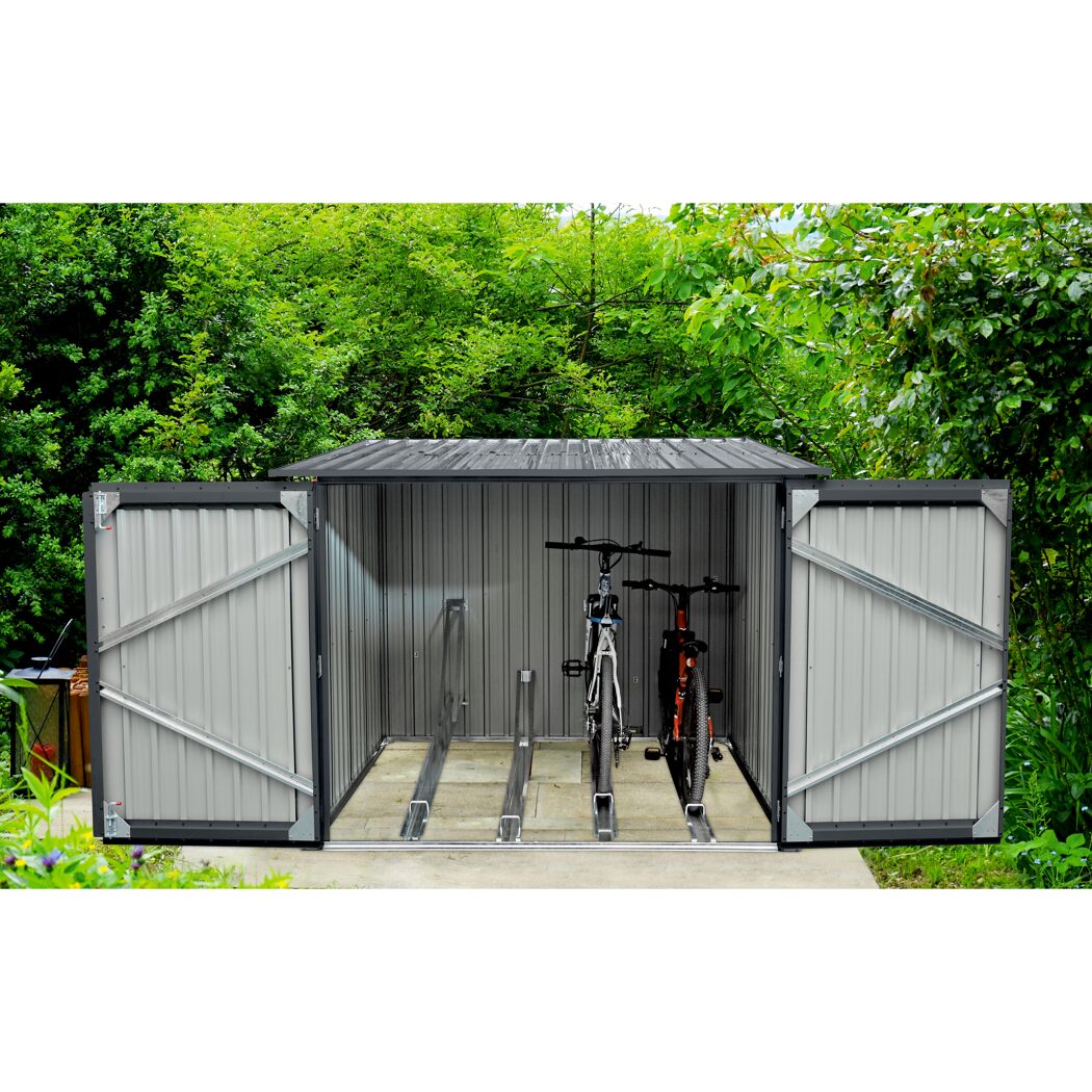 Grauer Fahrradschuppen mit zwei Fahrrädern darin