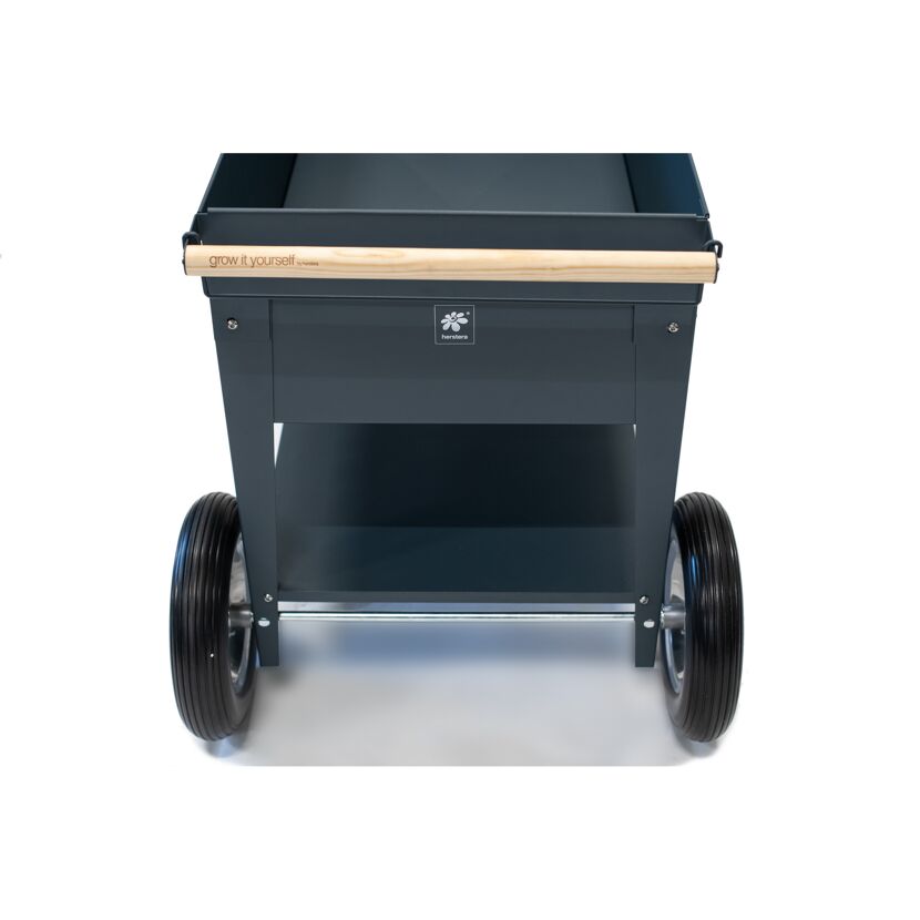 Schwarzer Kräuterwagen von Herstera mit Holzgriff.