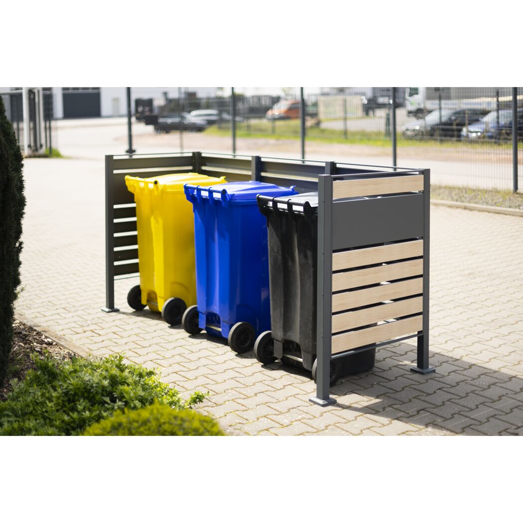 Mülltonnenverkleidung mit drei Mülltonnen in gelb, blau und schwarz