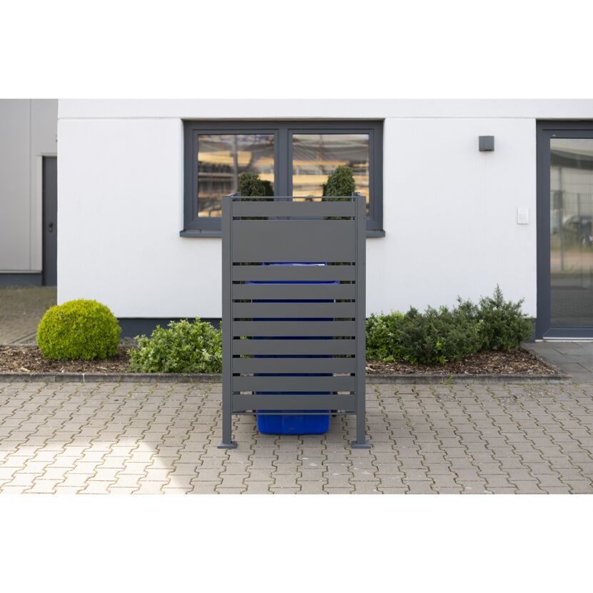 Graue Mülltonnenverkleidung mit blauer Mülltonne
