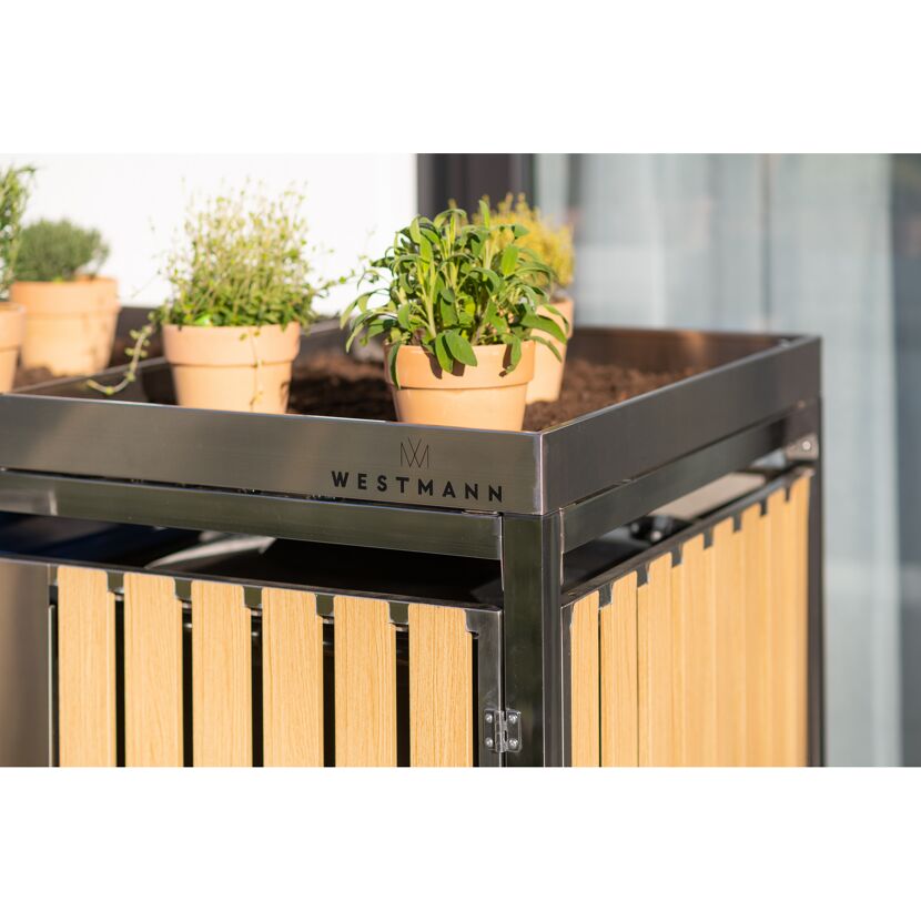 Westmann Mülltonnenbox mit bepflanzten Kräutertöpfen